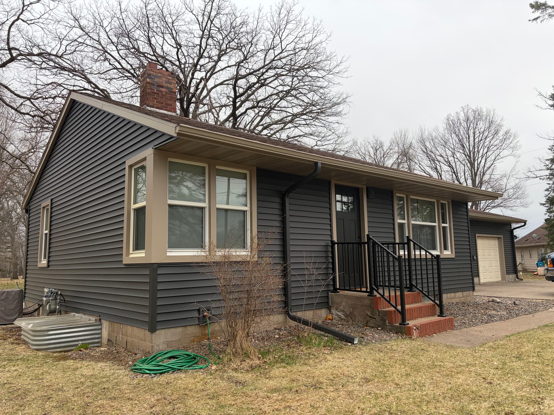 Gallery photos for New 5-Inch Gutter System with Color Matched Downspouts in Milaca: Image #3