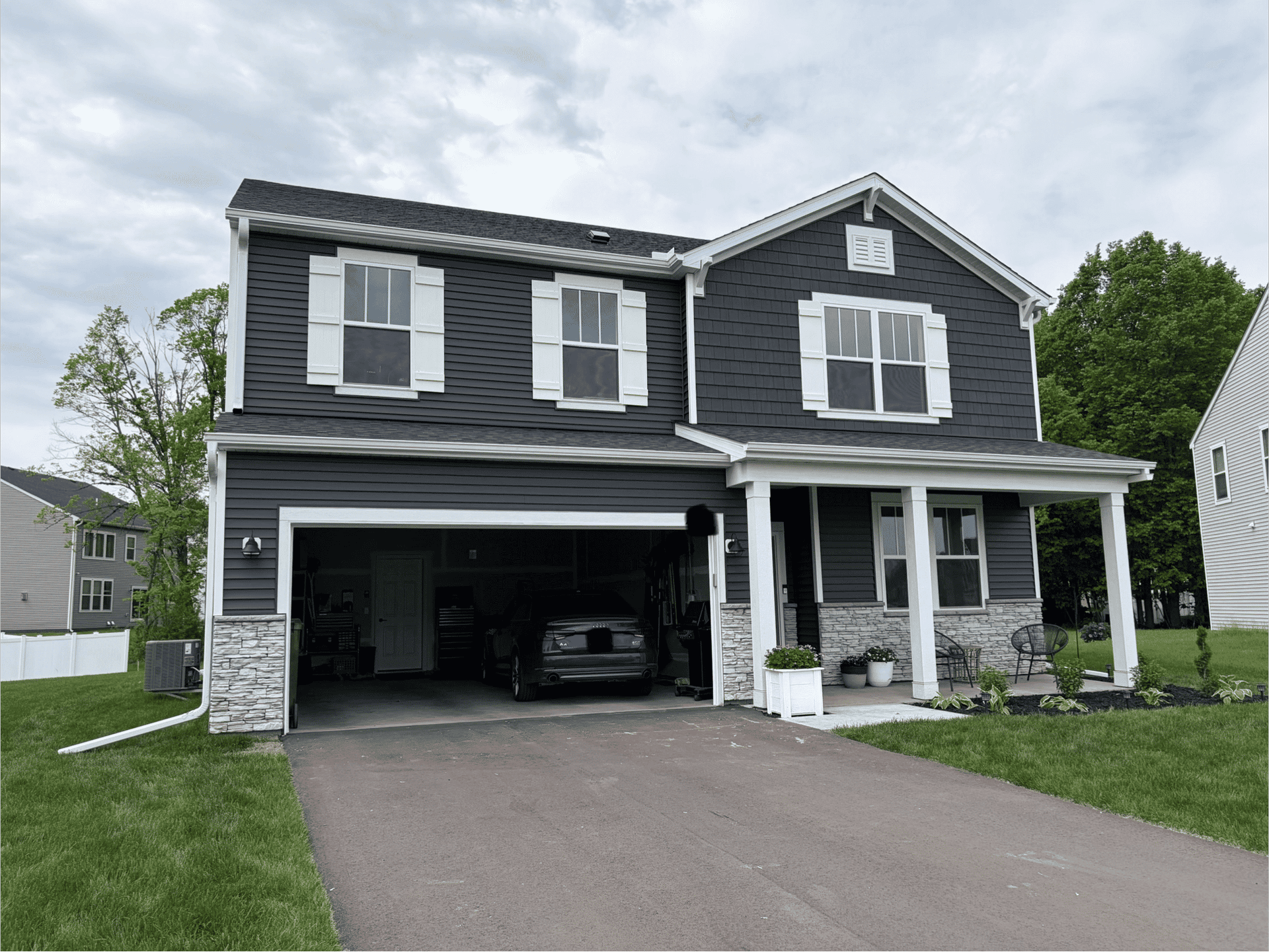 Seamless Gutter Installation on a Rogers Home image