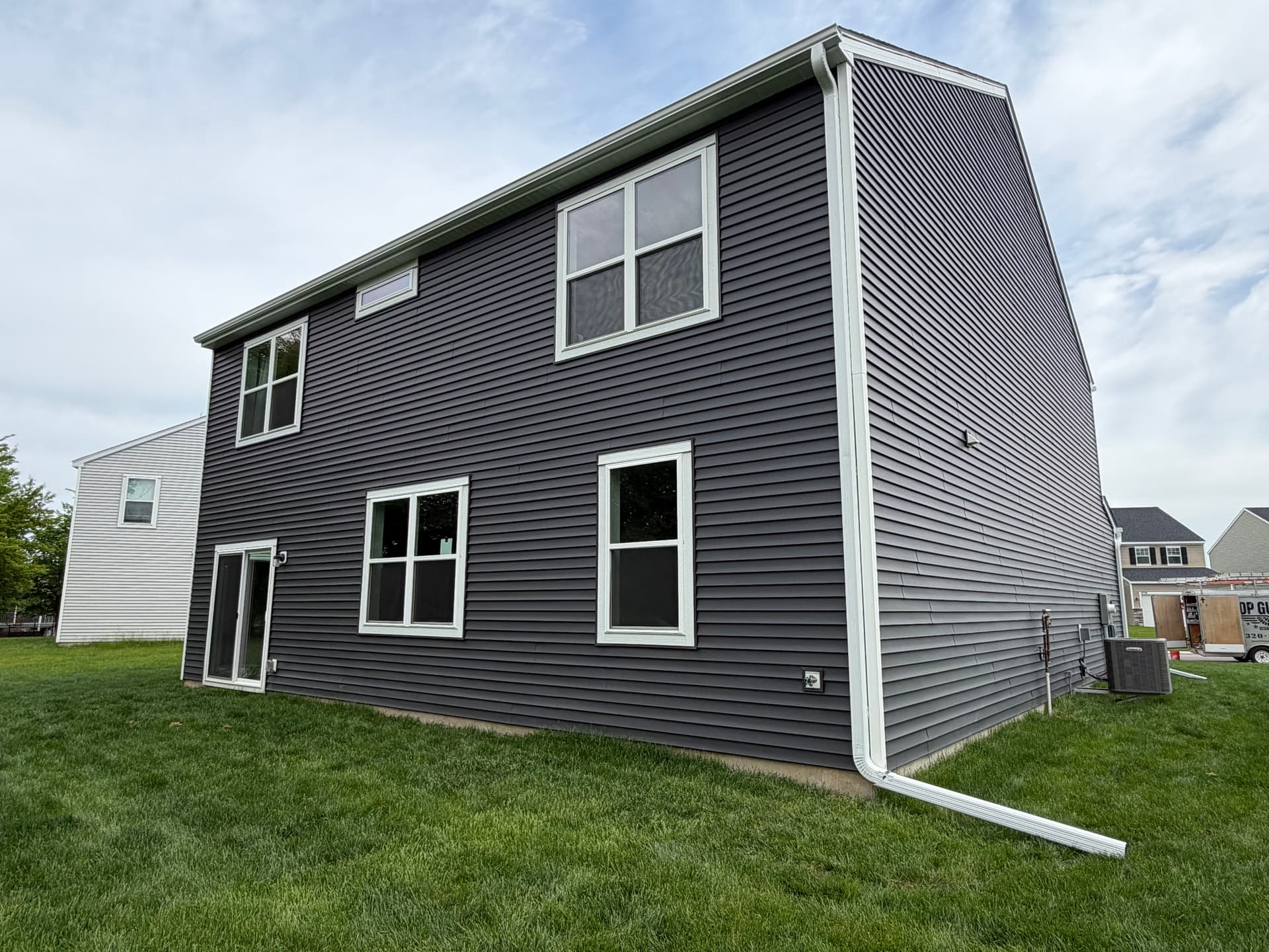 Gallery photos for Seamless Gutter Installation on a Rogers Home: Image #3