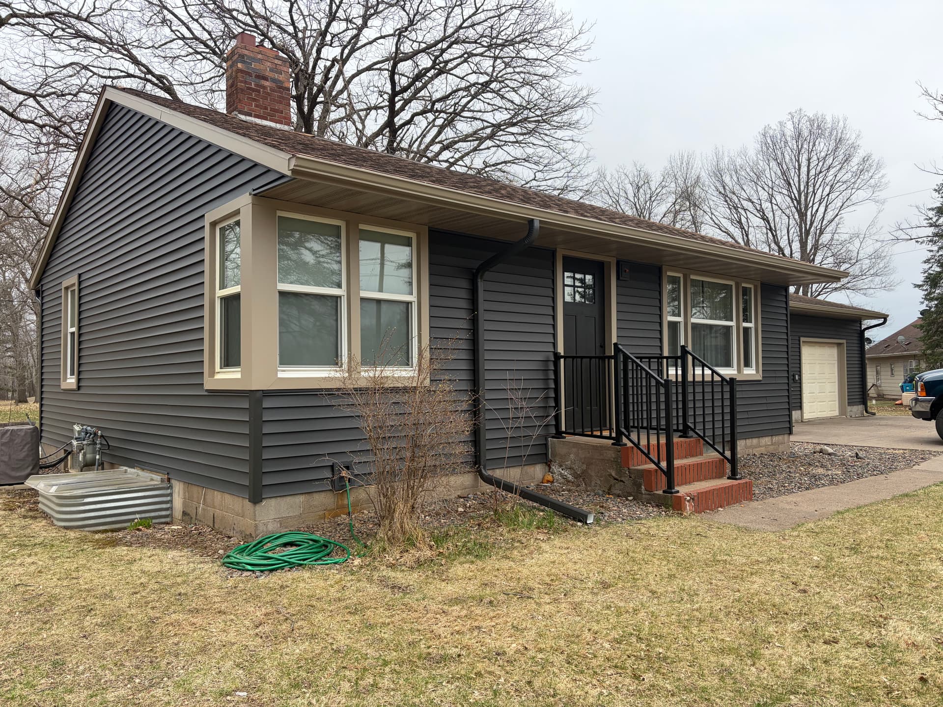 Gallery photos for New 5-Inch Gutter System with Color Matched Downspouts in Milaca: Image #2